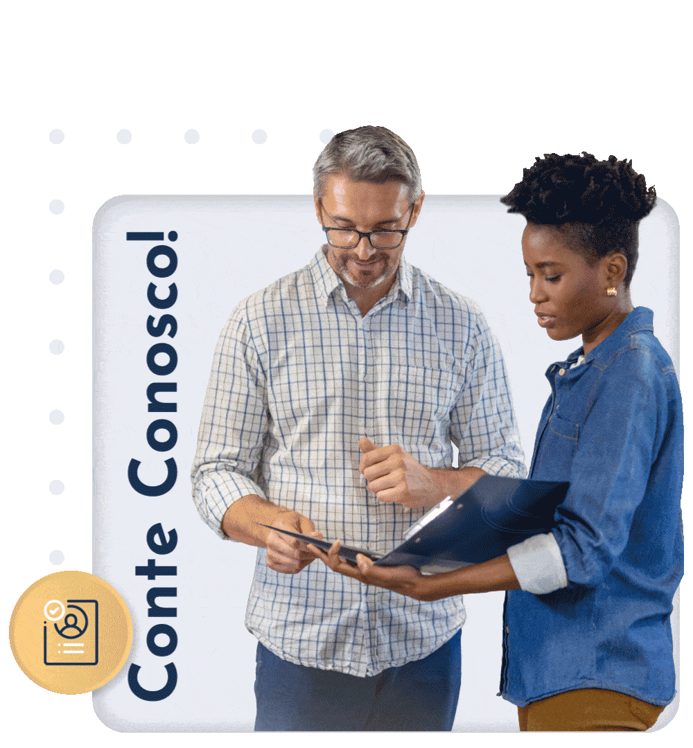 Imagem de um homem e uma mulher olhando para alguns documentos.